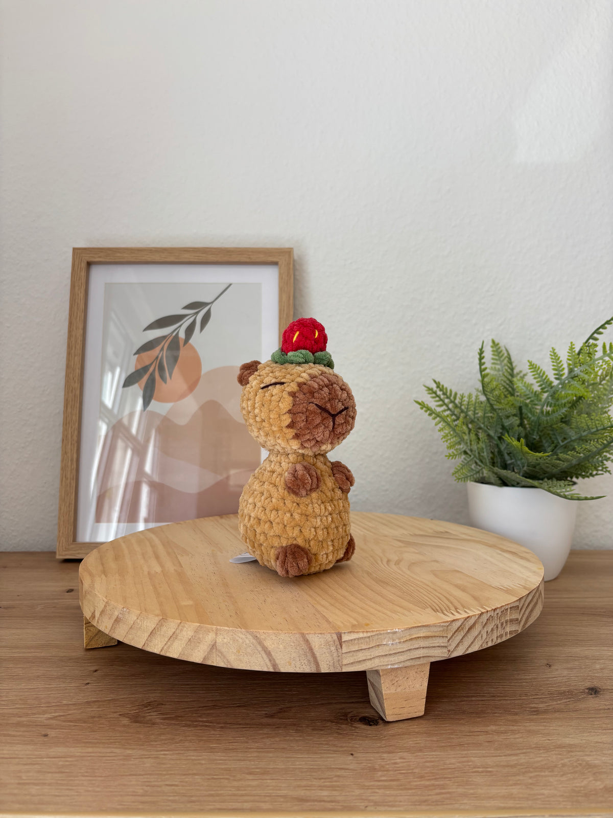 Capybara mit Erdbeere